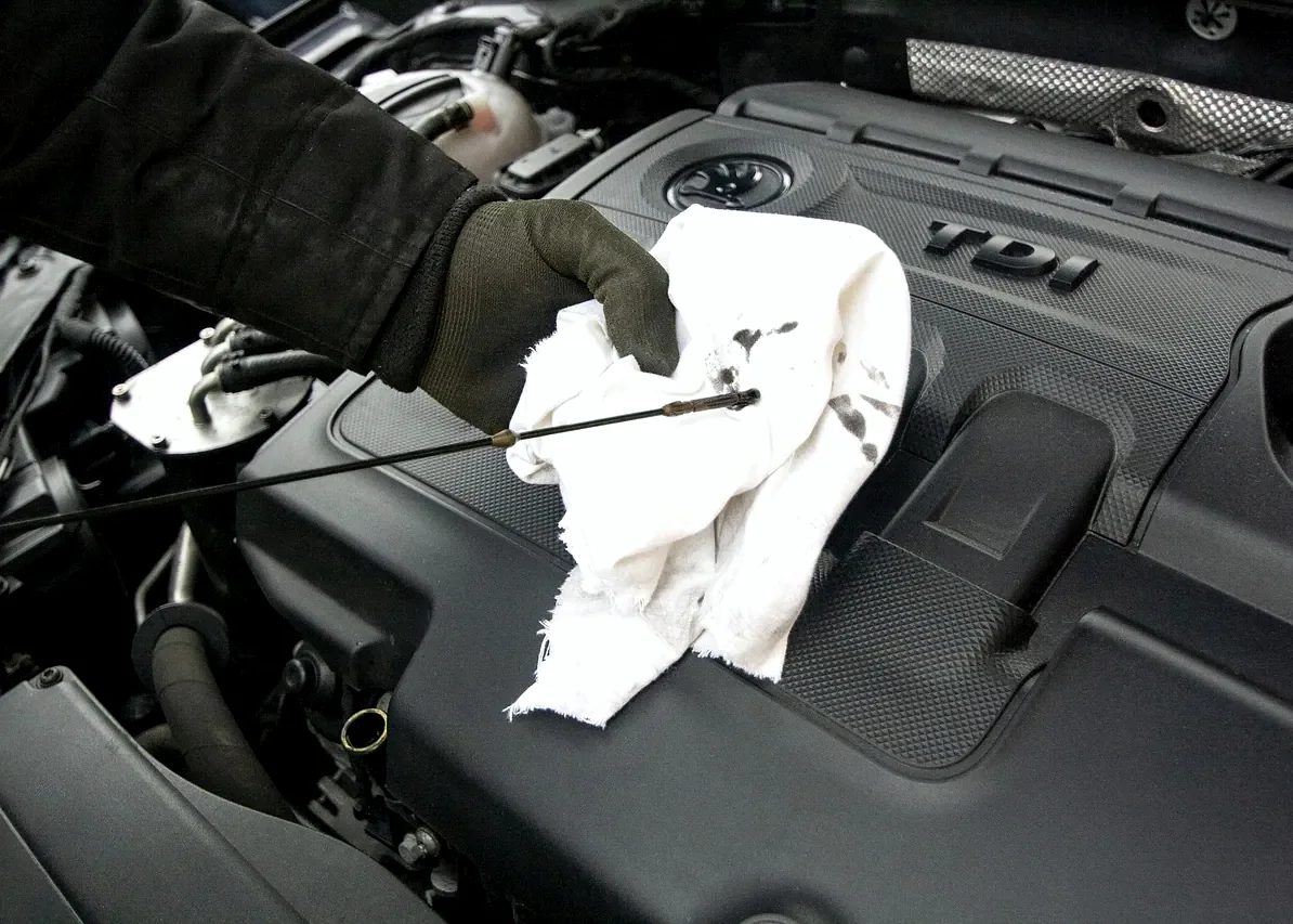 Auto body shop: oil, changing the oil, maintenance (stock photo)